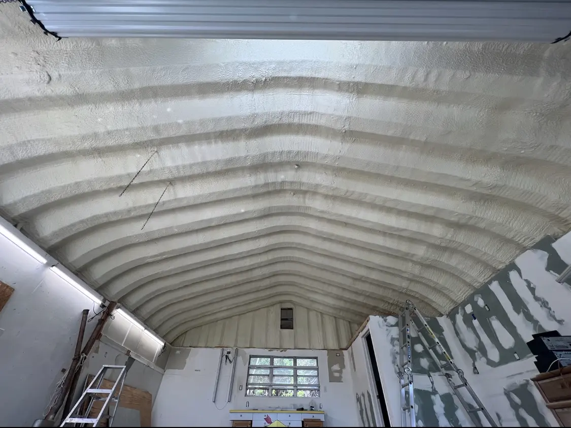 Spray polyurethane foam applied to the underside of a metal roof deck in Upper Chichester